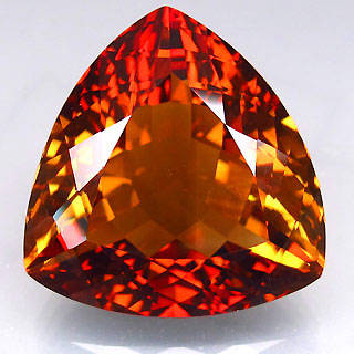 35.75ct VVS Trillion facet Topaz. Reddish orangish brown. [Value: +- R35k - R50k]