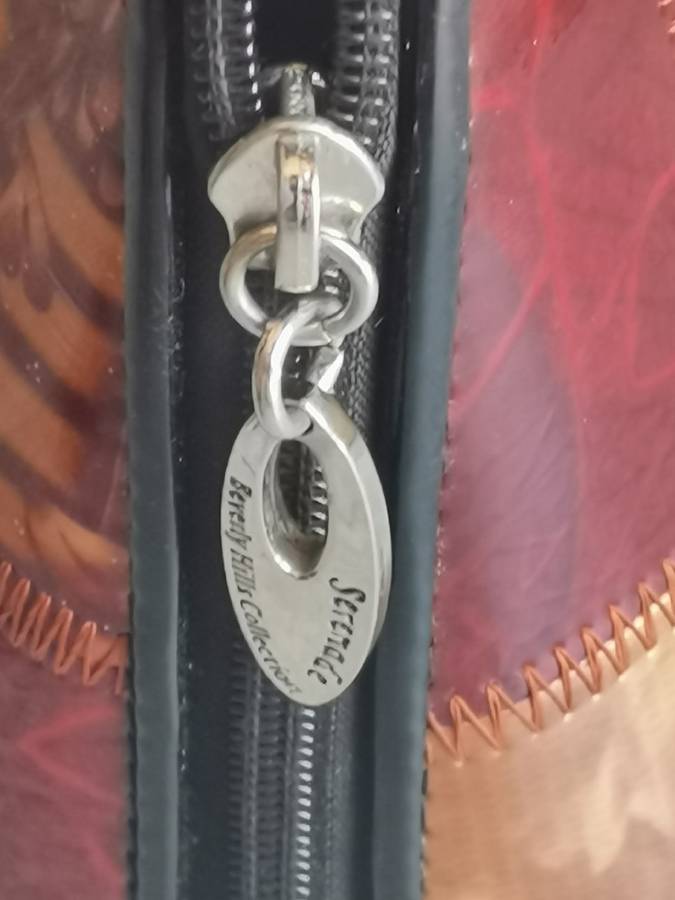 LADIES SERENADE BEVERLY HILLS VINYL MULTI COULOURED HANDBAG - RETAILS FOR OVER R2000