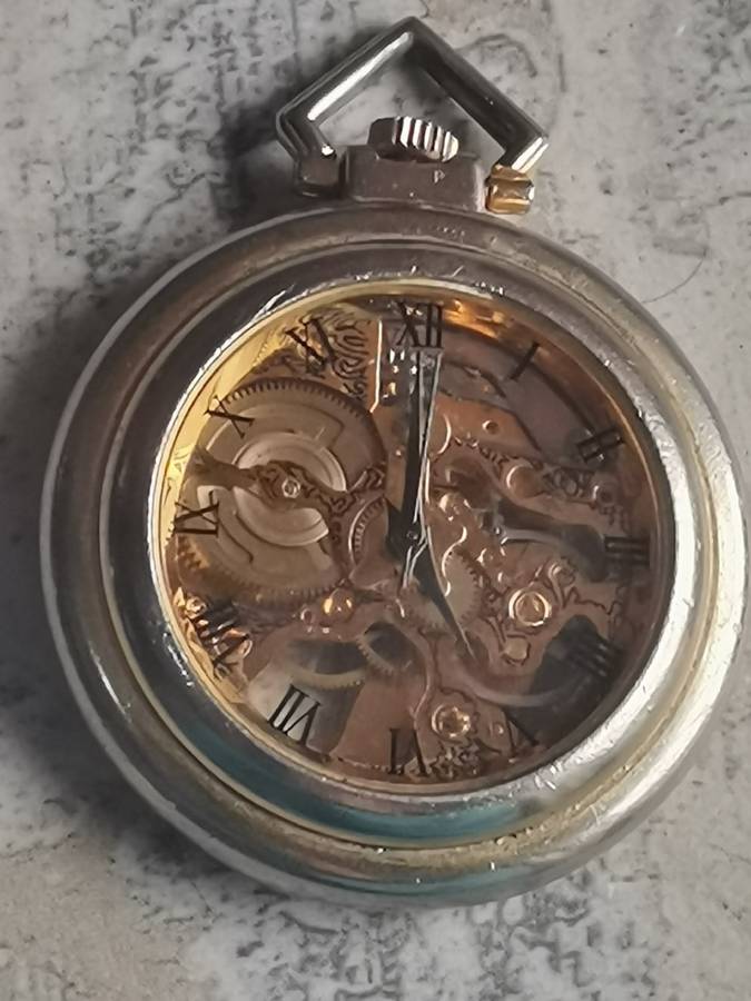 MENS SEE-THROUGH SKELETON TYPE POCKET WATCH IN EXCELLENT WORKING CONDITION