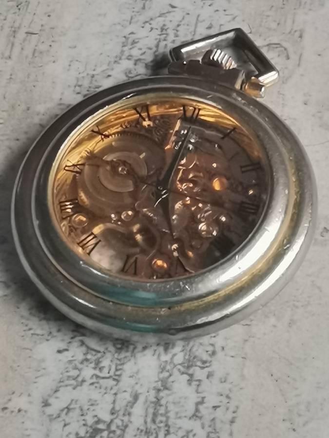 MENS SEE-THROUGH SKELETON TYPE POCKET WATCH IN EXCELLENT WORKING CONDITION