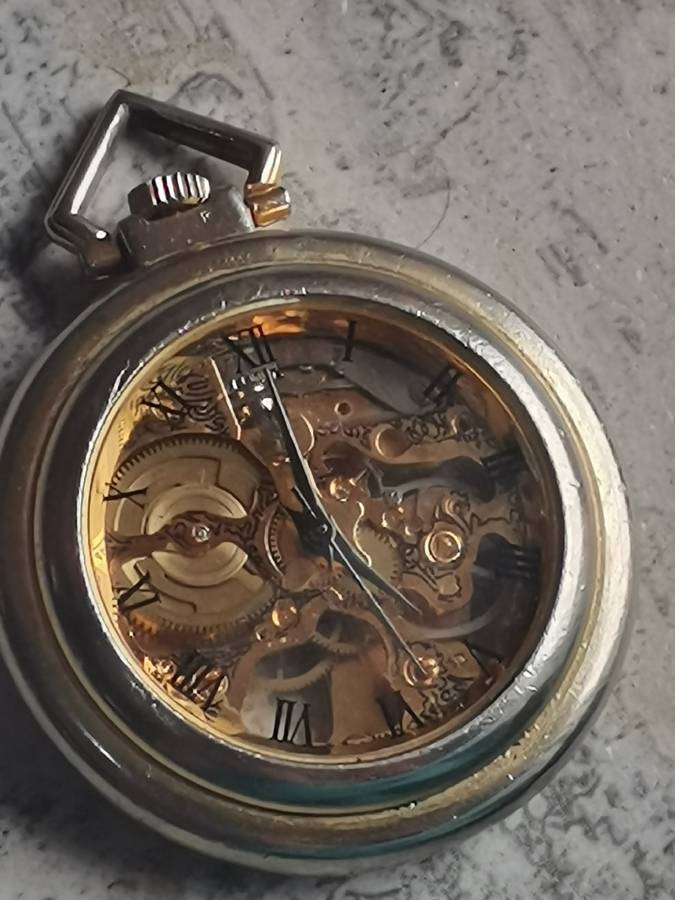MENS SEE-THROUGH SKELETON TYPE POCKET WATCH IN EXCELLENT WORKING CONDITION