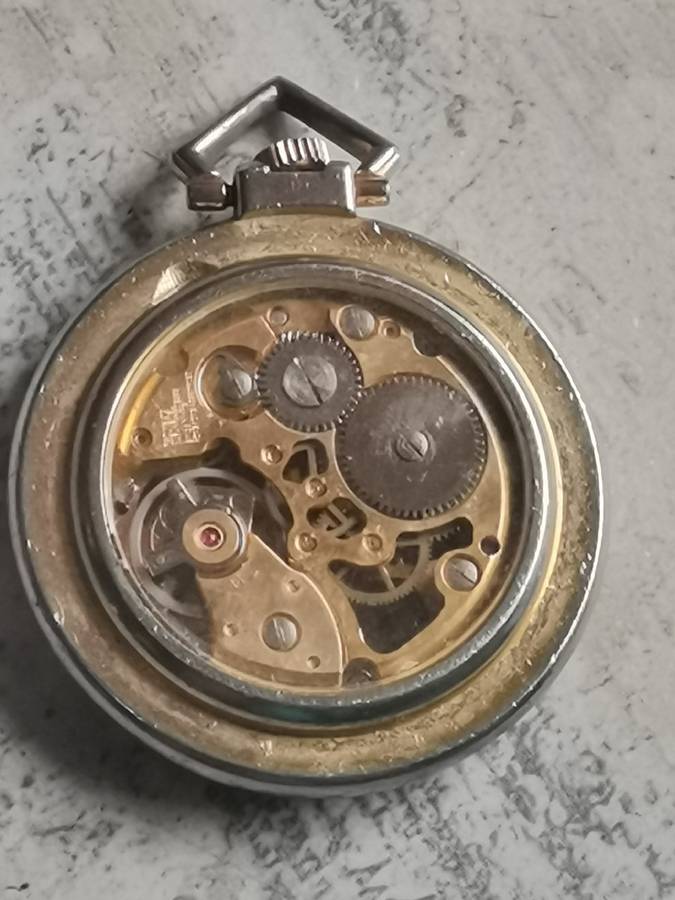 MENS SEE-THROUGH SKELETON TYPE POCKET WATCH IN EXCELLENT WORKING CONDITION