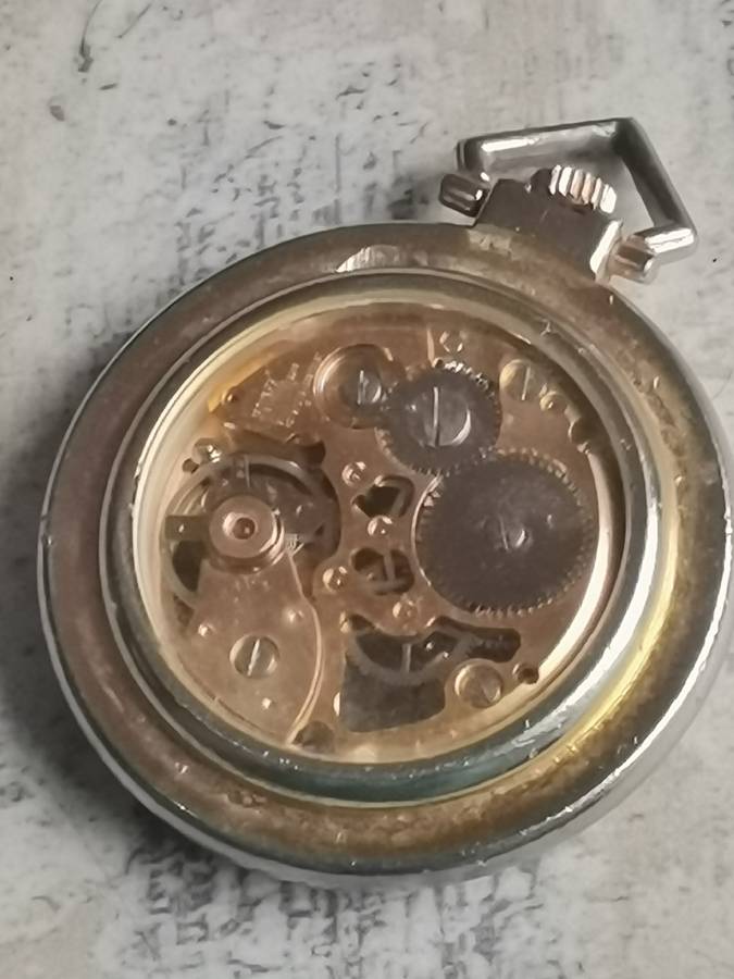 MENS SEE-THROUGH SKELETON TYPE POCKET WATCH IN EXCELLENT WORKING CONDITION