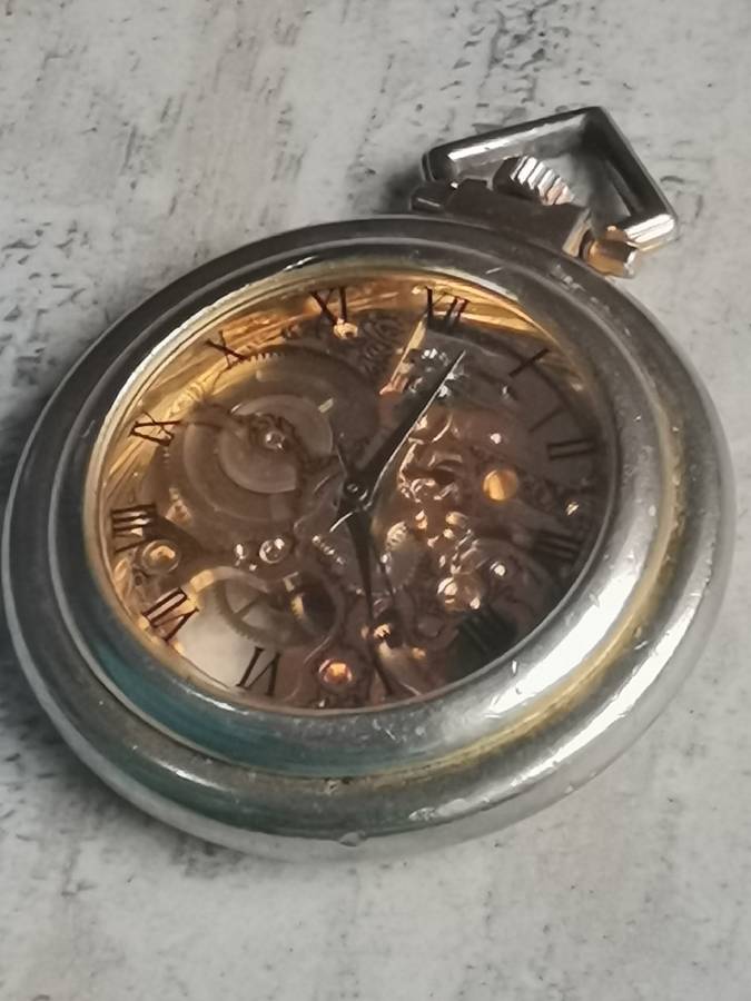 MENS SEE-THROUGH SKELETON TYPE POCKET WATCH IN EXCELLENT WORKING CONDITION