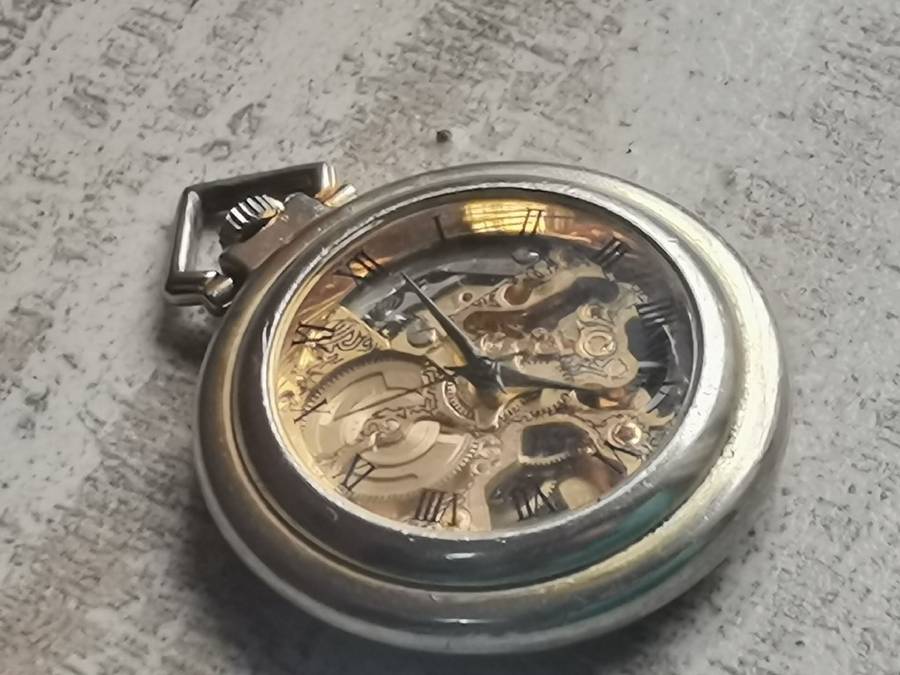MENS SEE-THROUGH SKELETON TYPE POCKET WATCH IN EXCELLENT WORKING CONDITION