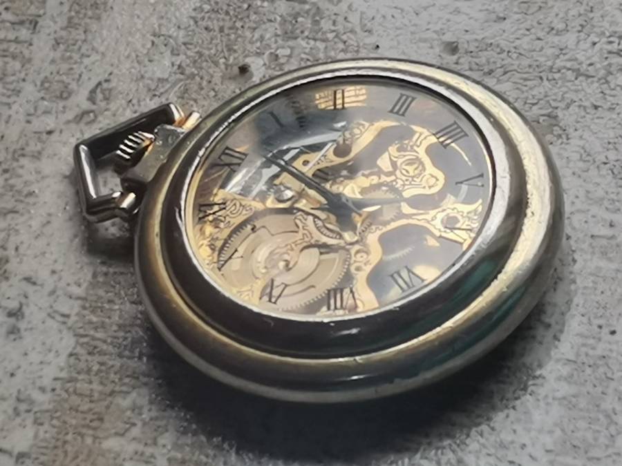 MENS SEE-THROUGH SKELETON TYPE POCKET WATCH IN EXCELLENT WORKING CONDITION