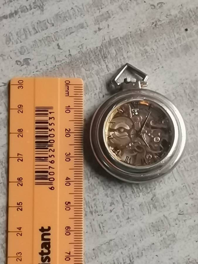 MENS SEE-THROUGH SKELETON TYPE POCKET WATCH IN EXCELLENT WORKING CONDITION