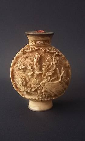 Antique Chinese ivory snuff bottle decorated with beautiful  carved relief
