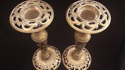 Stunning pair of candlesticks with beautiful detail.  One Bid