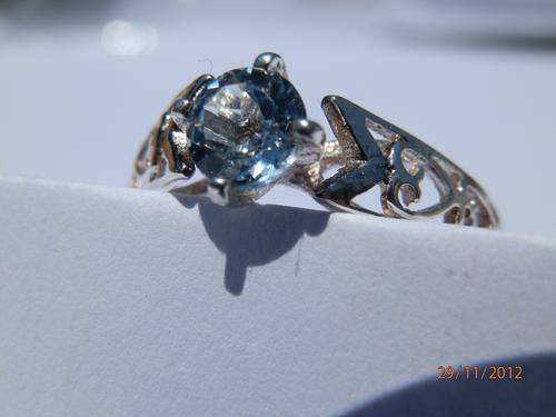Silver blue topaz scroll / filigree ring