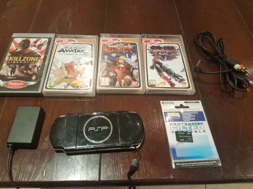 PSP SLIM CONSOLE WITH WIFI 4GB MCARD WITH FEW GAMES AND CABLES