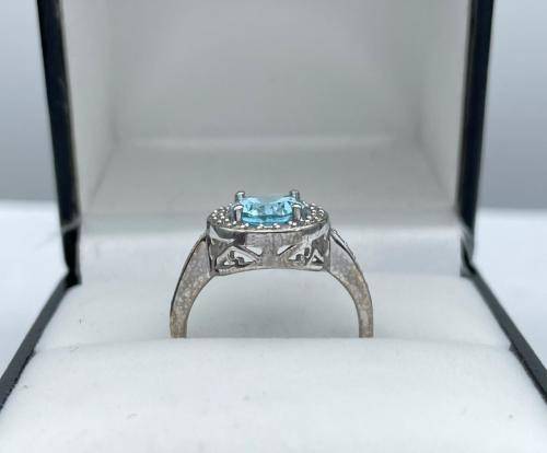 RETAIL:R3500 - NATURAL AQUAMARINE SILVER CZ HALO ETERNITY RING