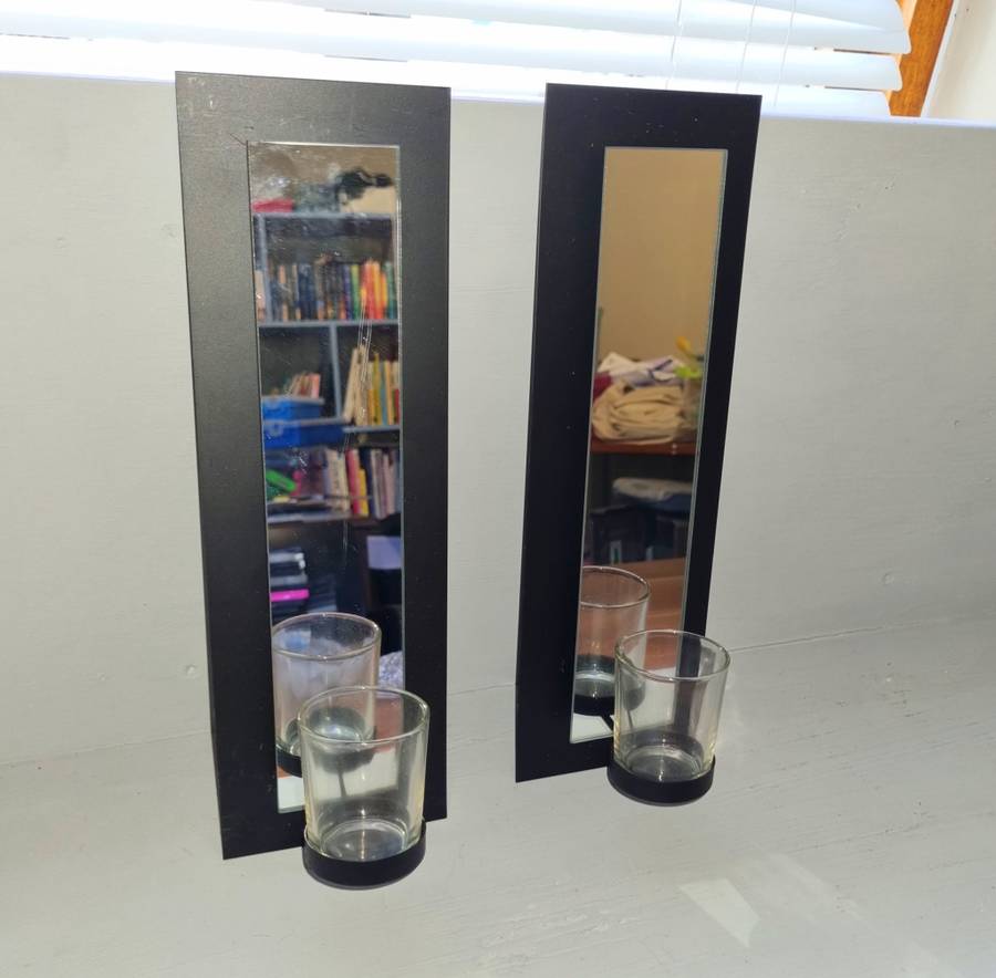 Wall mounted candle holders with mirrors