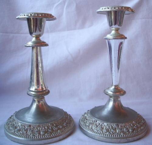 TWO SILVER PLATED CANDLESTICK HOLDERS