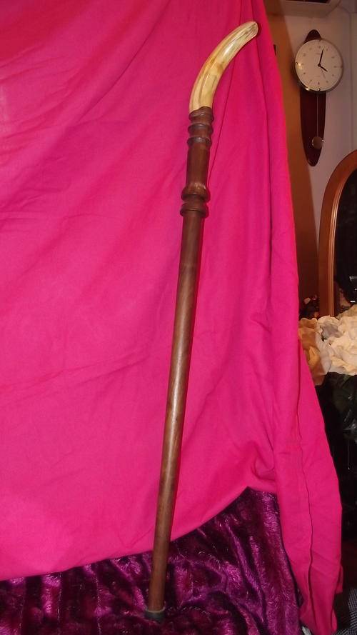 WARTHOG TUSK AND TAMBUTI WOOD, SWORD WALKING STICK WELL CRAFTED AND BEAUTIFULLY SELLING PRICE $ 450