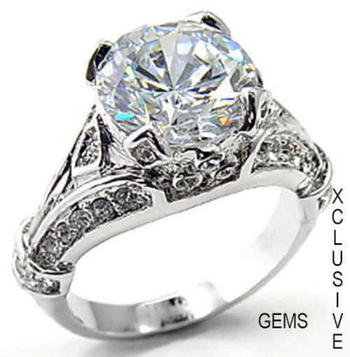 * R35 POSTAGE* 18K WHITE GOLD PLATED SIMULATED DIAMOND LADIES RING