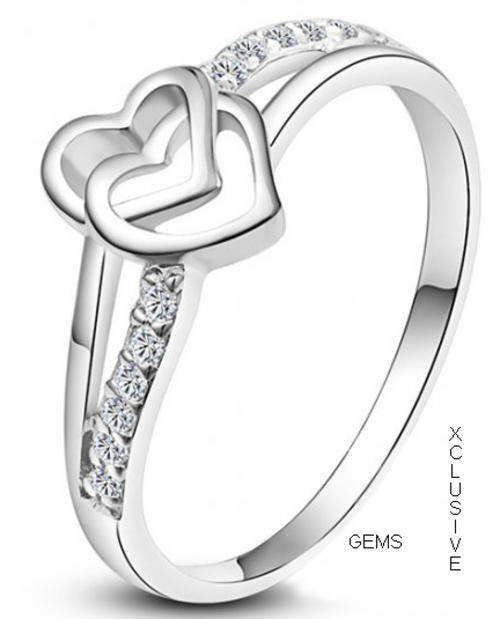 * R35 POSTAGE* 18K WHITE GOLD PLATED SIMULATED DIAMOND LADIES RING