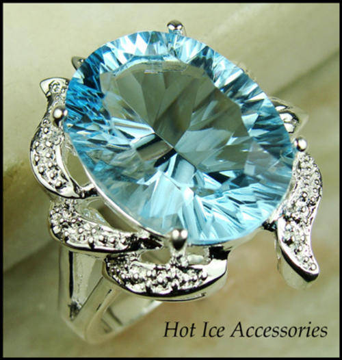 **INTERNATIONAL SHIPPING** STERLING SILVER SIMULATEDBLUE TOPAZ RING