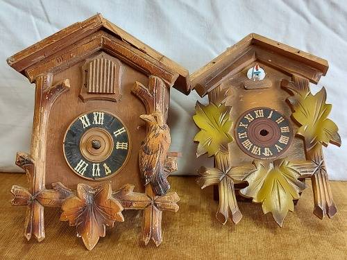 PARTS OF TWO CUCKOO CLOCKS FOR SPARES