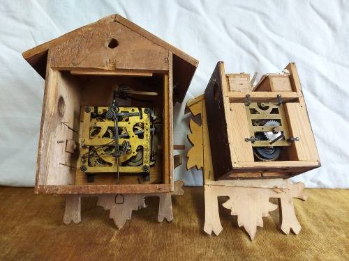 PARTS OF TWO CUCKOO CLOCKS FOR SPARES