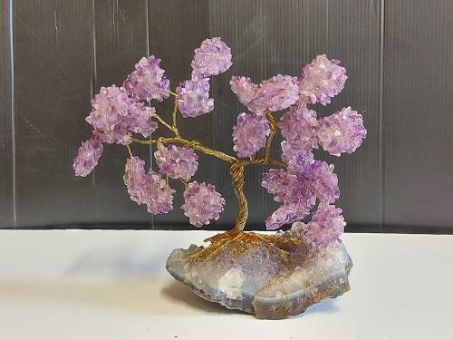 STUNNING AMETHYST CRYSTALS TREE MOUNTED ON A SMALL SEGMENT OF AN AMETHYST GEODE