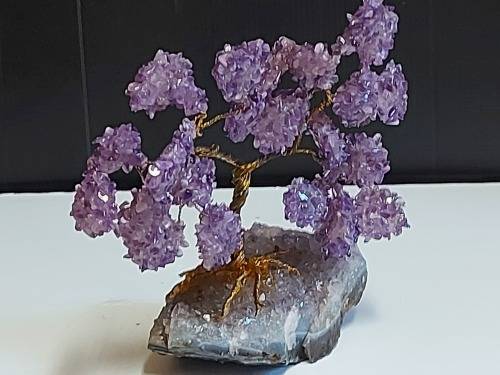 STUNNING AMETHYST CRYSTALS TREE MOUNTED ON A SMALL SEGMENT OF AN AMETHYST GEODE