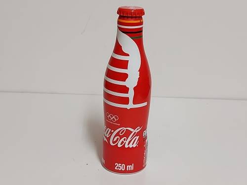 COMMEMORATIVE OLYMPICS METAL/ALUMINIUM COKE BOTTLE, SEALED AND FULL