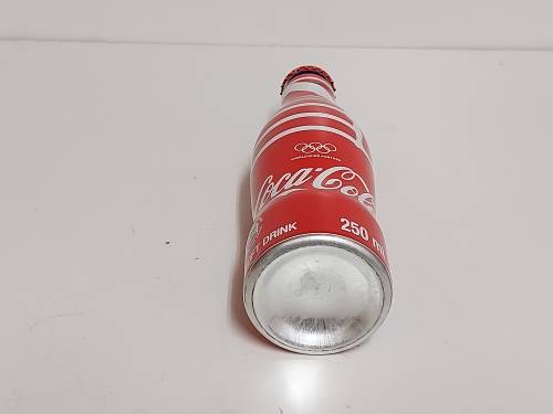 COMMEMORATIVE OLYMPICS METAL/ALUMINIUM COKE BOTTLE, SEALED AND FULL