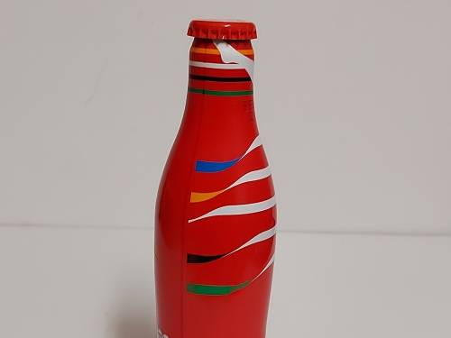 COMMEMORATIVE OLYMPICS METAL/ALUMINIUM COKE BOTTLE, SEALED AND FULL