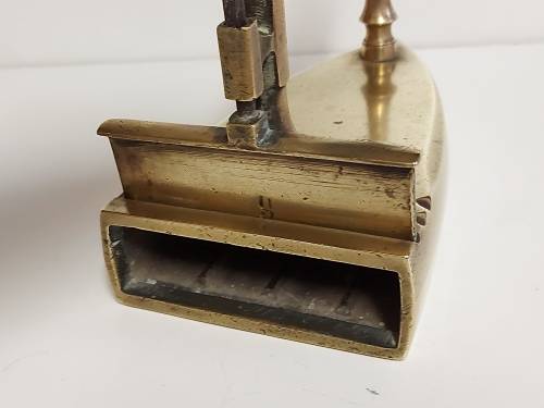 ANTIQUE BRASS SAD NO 9 FLAT CLOTHES IRON WITH A COAL GATE AND CHIMNEY AT THE REAR