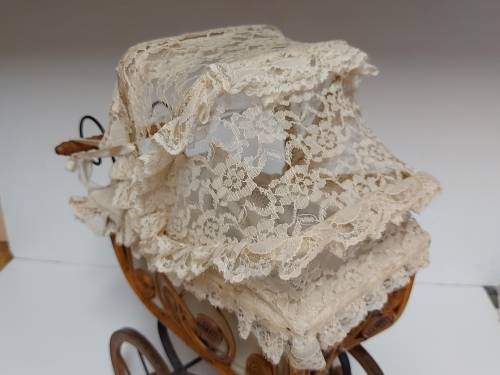AWESOME! STUNNING VINTAGE ORNATE DESIGN CANE AND STEEL DOLL`S PRAM WITH A LACE BONNET