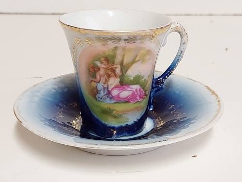 AWESOME RARE VINTAGE VICTORIA AUSTRIA FLOW BLUE CUP AND SAUCER