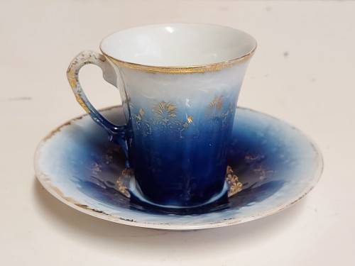AWESOME RARE VINTAGE VICTORIA AUSTRIA FLOW BLUE CUP AND SAUCER