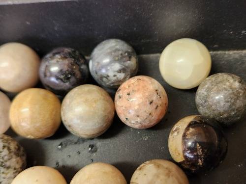 COLLECTION OF 37 HIGHLY POLISHED SEMI-PRECIOUS GEMSTONE SPHERES