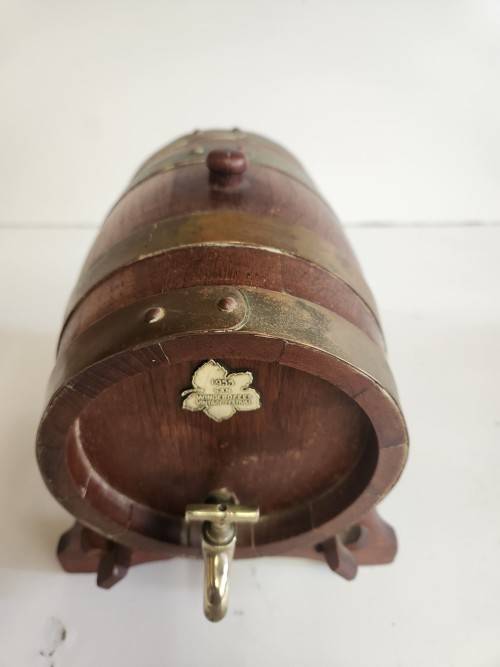 VINTAGE OAK WINE BARREL WITH BRASS HOOPS ON A CUSTOM MADE STAND
