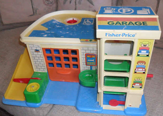 FISHER PRICE VINTAGE GARAGE WITH SOME DAMAGE