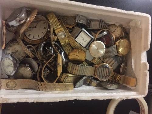 Box full of broken mechanical old watches
