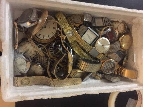 Box full of broken mechanical old watches