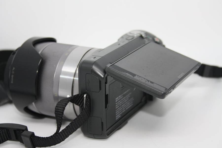 Sony Alpha NEX-3 Interchangeable Lens Digital Camera With SONY 18-55 LENS OSS ,4GB ,Charger, and Bag
