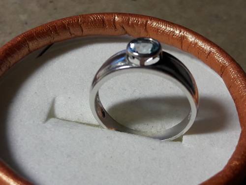 LOVELY SOLID GENUINE STERLING SILVER RING IN EXCELLENT CONDITION.