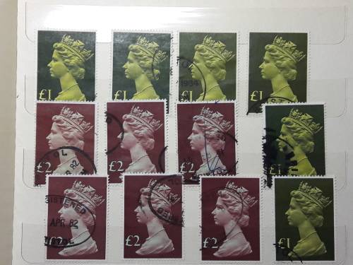 STAMP ALBUM WITH 230 STAMPS