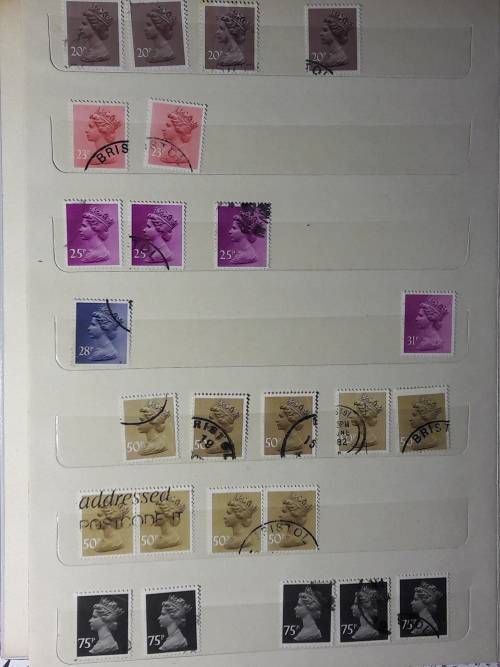 STAMP ALBUM WITH 230 STAMPS