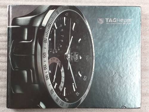 TAG HEUER BOOK 127 PAGES HARD COVER WITH COLOUR FOTO`S ON EACH PAGE IN EXCELLENT CONDITION - RARE