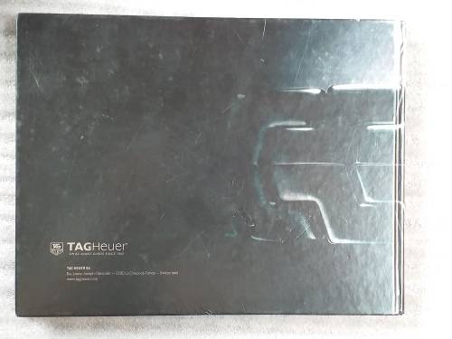 TAG HEUER BOOK 127 PAGES HARD COVER WITH COLOUR FOTO`S ON EACH PAGE IN EXCELLENT CONDITION - RARE