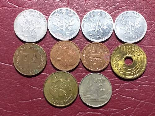 A LOT OF 10 INTERNATIONAL COINS - [One bid for the lot.]