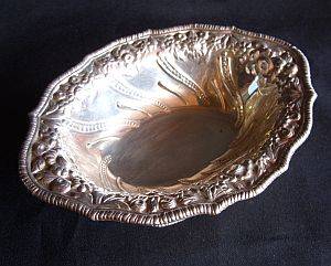 A silver plate sweet bowl with raised decoration