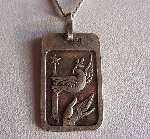STERLING SILVER NECKLACE WITH A MAGICAL SILVER PENDANT