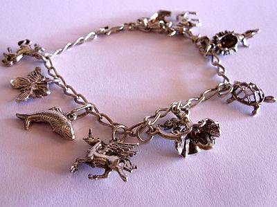24 HR AUCTION !!!! STERLING SILVER CHARM BRACELET WITH AMAZING CHARMS