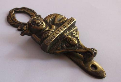 A CHARMING ANTIQUE INTERNAL DOOR KNOCKER DEPICTING THE CHESTER IMP ....PIXIE TYPE CREATURE...CUTE !!