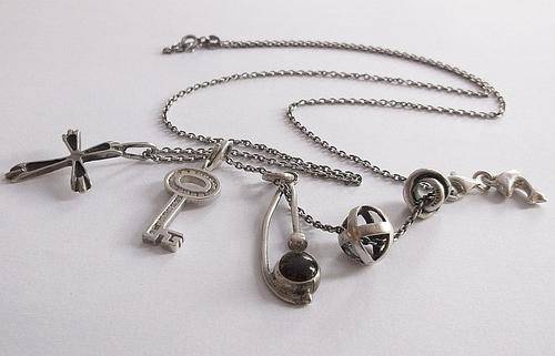 BIG DEAL !! ONE STERLING SILVER NECKLACE AND 8 DIFFERENT WAYS TO WEAR IT ....NICE ONE !!